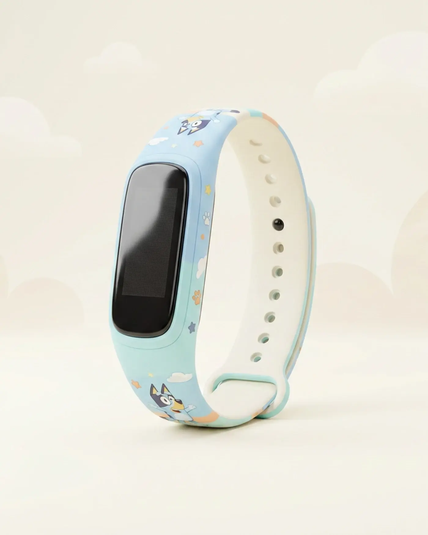 A rendered fitness band with a pale blue strap printed with a cartoon dog pattern, standing on a cream ground.