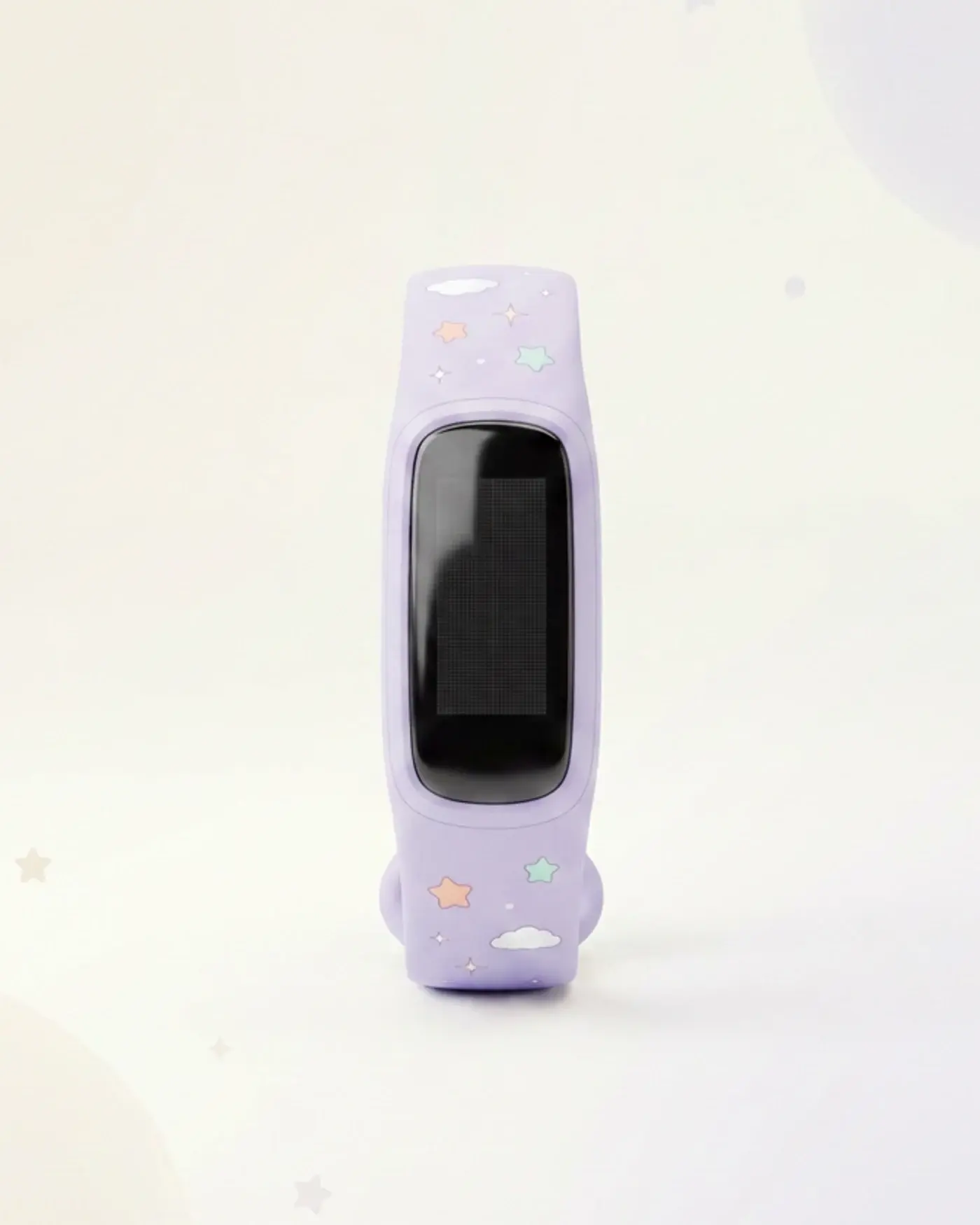 A rendered fitness band with a lilac strap printed with small stars and clouds, on a pale ground.