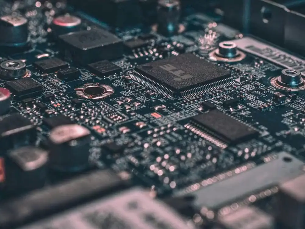 A macro photograph of a populated circuit board.