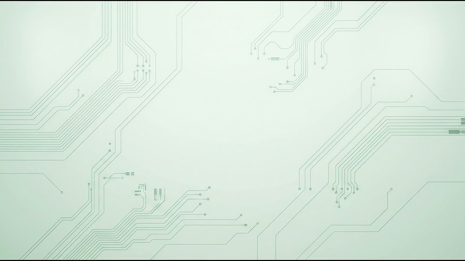 A macro view of pale green circuit-board traces filling the frame.